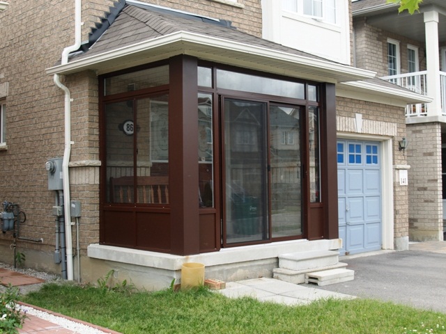 Conner porch enclosure at front of house 